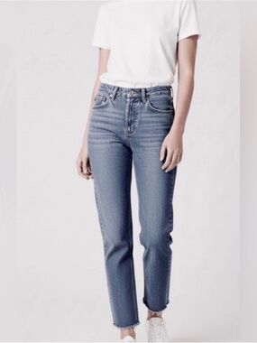 Vintage Polo Mom High
Waisted
Company Ralph Lauren Jeans
raw hem size 23/24